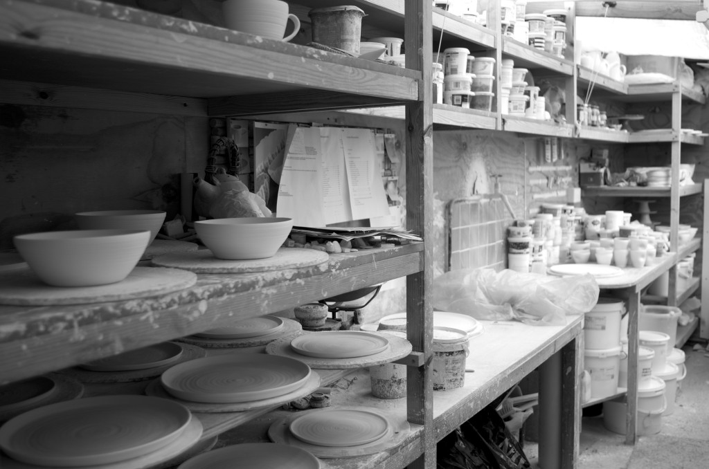 pottery studio showing shelving, workbenches and my sink