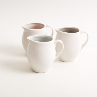 stoneware range- cafe tableware- pink interior- jug- flowers- water jug - designed by linda bloomfield- blue- grey