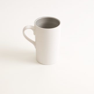 porcelain tableware- made in china- grey mug- linda bloomfield- porcelain designer- tableware designer- ruth cross- knitted cosy- mug cosy
