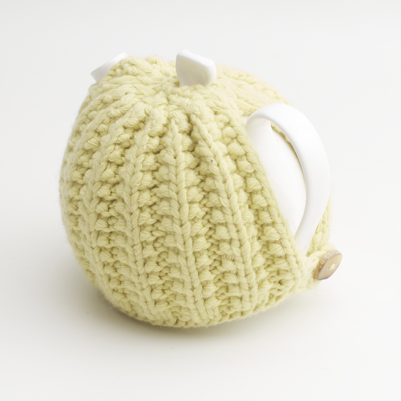Bone China Teapot designed by Linda Bloomfield, with zesty lemon knitted cosy by Ruth Cross