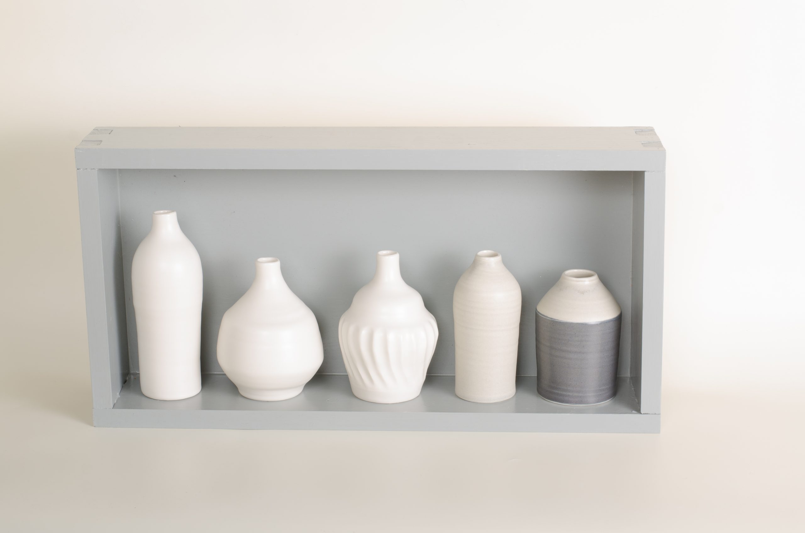 Hand thrown bottles, in white, grey, and black, inspired by morandi paintings.